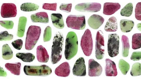 Ruby zoisite jewel stones set texture on light white isolated background. Mac Stock Footage 221776575