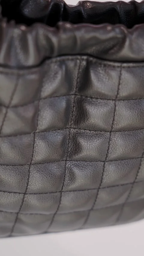 Ruched Drawstring Detail in Quilted Black Ecological Leather with Soft Finish Stockbeeldmateriaal 307169964