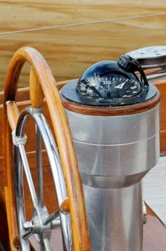 Rudder and compass Stock Photos
