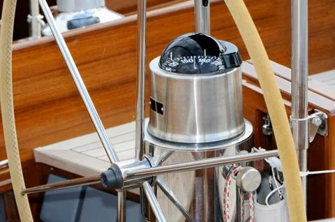 Rudder and compass Stock Photos