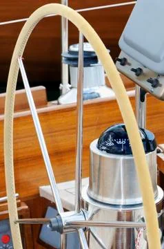 Rudder and compass Stock Photos