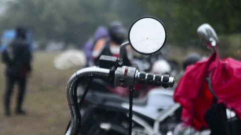 Rudder motobike in the rain Stock Footage