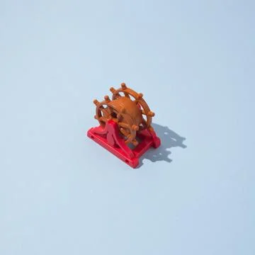 Rudder with sharp shadow, with copy space on blue background. Minimal summe.. Stock Photos