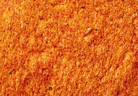 Ruddy crust of bread as an abstract background. Texture 스톡 사진