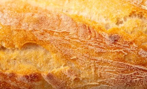 Ruddy crust of bread as an abstract background. Texture Foto stock