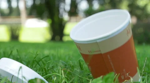 Rude man throws down a plastic cup for  takeaway coffee 스톡 동영상 51417617