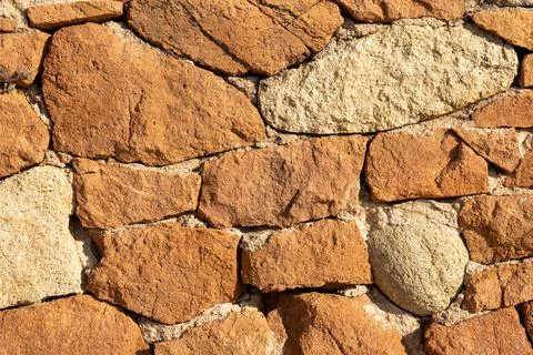 Rude stone wall surface texture Stock Photos