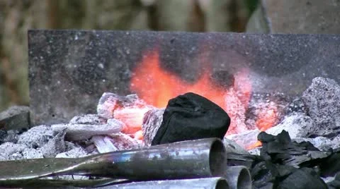 Rudimentary forge at medieval reenacment close up Stock Footage 12614583