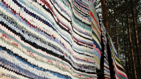 Rug beating in slow motion Stock Footage 88059435