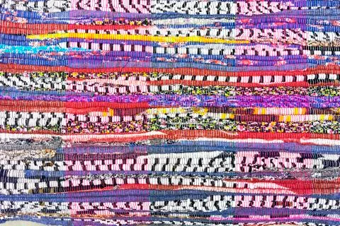 Rug of pieces of cloth. Texture and background of patchwork carpet. 스톡 사진