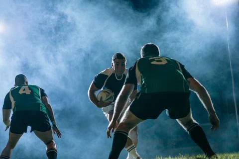 Rugby action under lights Stock Photos