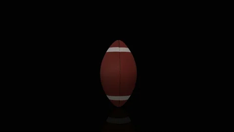 Rugby Ball turns on itself Stock Footage 239381647