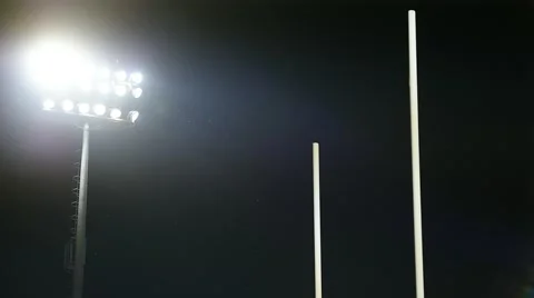 Rugby goal posts on stadium at night Видео 64513951