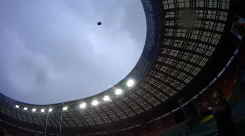 Rugby player catch the ball under the rain Stock Footage 30092092