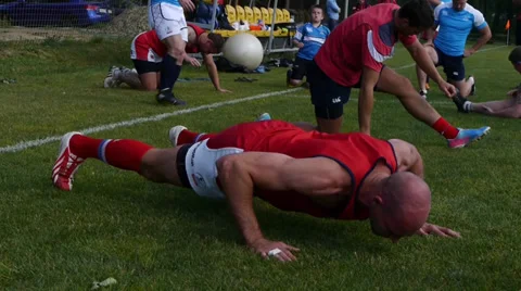 Rugby player does push-ups Stock Footage 30098293