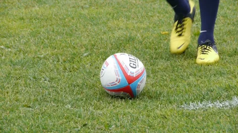 Rugby player kicks the ball Stock Footage 30096685