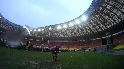 Rugby player throwes up the ball Stock Footage 30104807