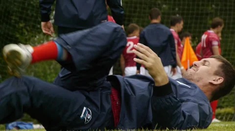 Rugby player warms up Stock Footage 30099615