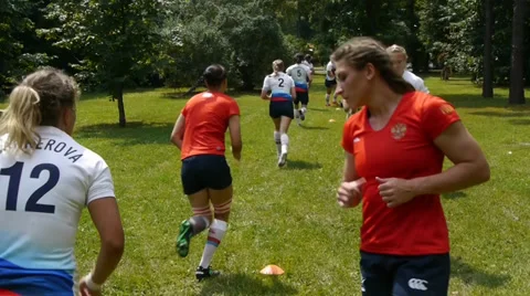Rugby players run Stock Footage 30090380