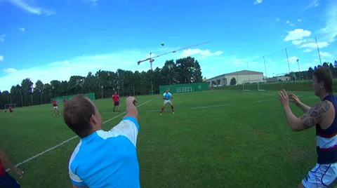 Rugby players throw the balls each to other Stock Footage 30094150
