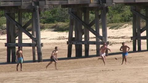 Rugby players training on the beach Stockbeeldmateriaal 196061702