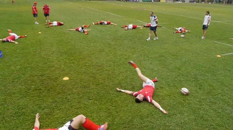 Rugby players warm up Stock Footage 30102971