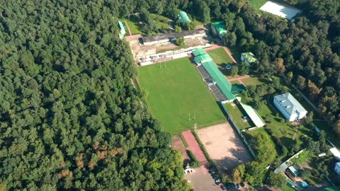 Rugby's pitch inside the park. Small stadium in circle view from above, Stock Footage 140816701