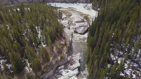 Rugged aerial view of boreal river canyon in spring Stock Footage 107978685