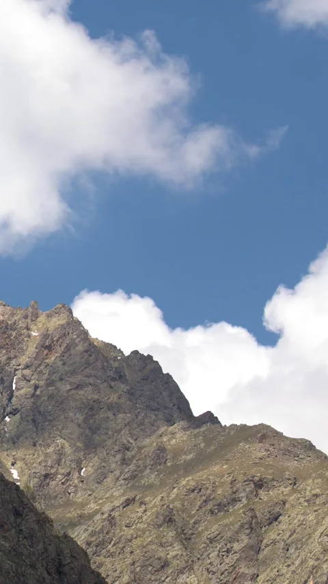 Rugged Alpine Peaks and Moving Clouds in the Italian Alps Stock Footage 341301014