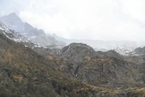 Rugged Alps with Clouds Fotos Stock