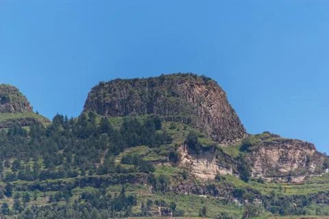 Rugged Basalt Cliffs and Lush Green Slopes of the Ethiopian Highlands 写真素材