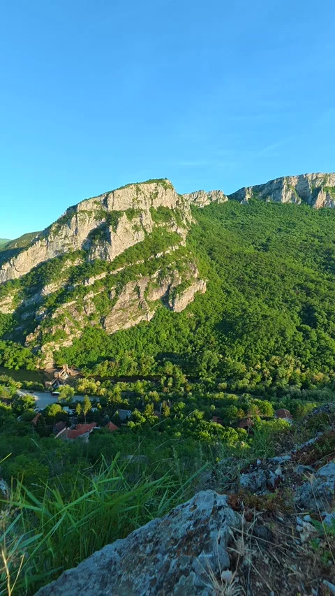 Rugged canyon rise under clear blue skies. Sicevo Gorge, Serbia. Vertical Stock-Footage 337058157