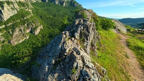 Rugged cliff edge with wild greenery. Sicevo Gorge, Serbia. Stock Footage 337052011