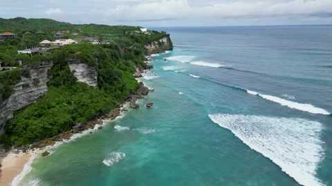 Rugged Cliffs and Ocean Waves Along Bali’s Southern Coast Stock Footage 314987743
