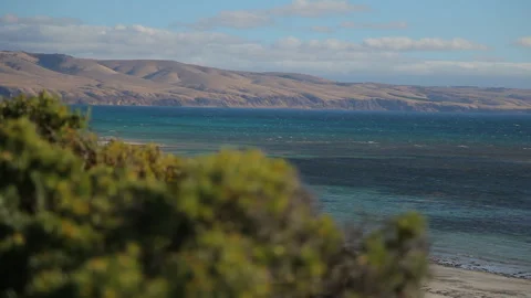 Rugged cliffs with beautiful blue ocean South Australia Stock Footage 245593640