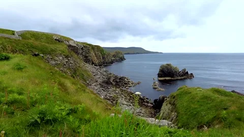 Rugged Coastline On Calm Moody Grey Day, The Knab, Lerwick, Shetland UK Stock Footage 247911062