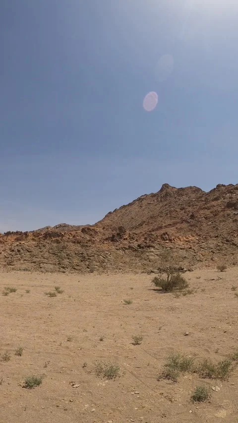 Rugged Desert Mountain Landscape Under Bright Sun Stock Footage 346194716