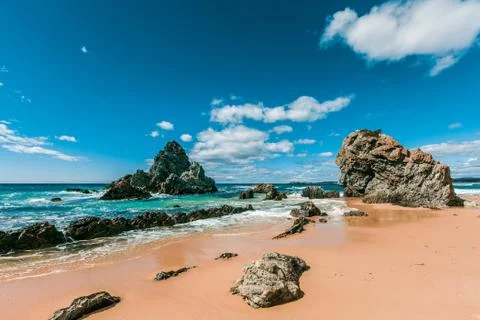 Rugged eroding rocks on ocean coastline. NSW, Australia Stock Photos