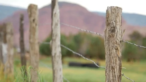 Rugged fence with mountain view Vídeos de archivo 71388210