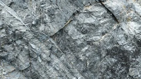 Rugged Grey Limestone Cliff Face Texture Surface Close Up Shot Stock Photos