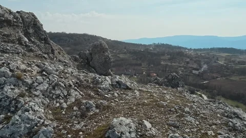 Rugged hillside with scattered rocks and sparse grass. Mount Rtanj Area, Serbia Vidéo 331106504