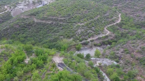 Rugged Hillside with Trails and Sparse Vegetation in Rajasthan Stock Footage 312364889