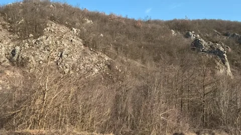 Rugged hillside under clear blue sky. Mount Rtanj Area, Serbia 스톡 동영상 331281614