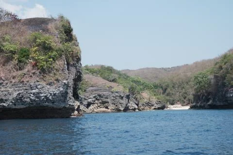 Rugged Limestone Cliffs Meet Tropical Waters Stock Photos