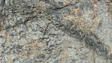 Rugged Limestone Rock Face Texture Showing Natural Mineral Patterns In Phet.. Stock Photos