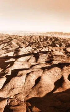 Rugged Mountain Landscape With Deep Shadows Under Hazy Sky Sepia Tone Aeria.. Stock Photos
