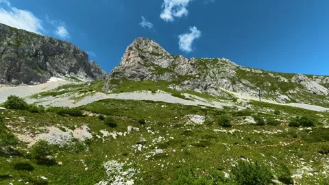 Rugged mountain peaks rise under bright blue skies. Savin Kuk peak, Montenegro 库存影片 342982712