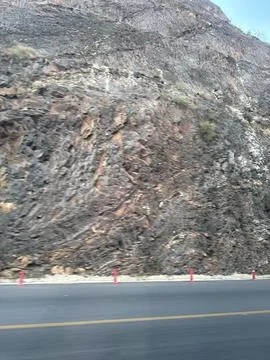 Rugged Mountain Roadside Cliff Stock Photos