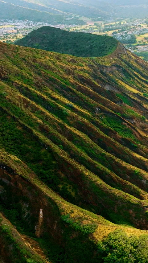 Rugged mountain slope with deep erosion and valley view. Vertical video. Stock Footage 319759672