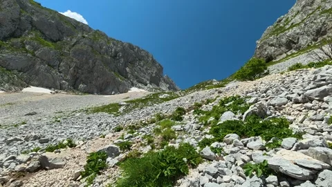 Rugged mountain slope under bright blue sky. Savin Kuk peak, Montenegro 스톡 동영상 342977951